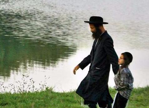 אומן:
